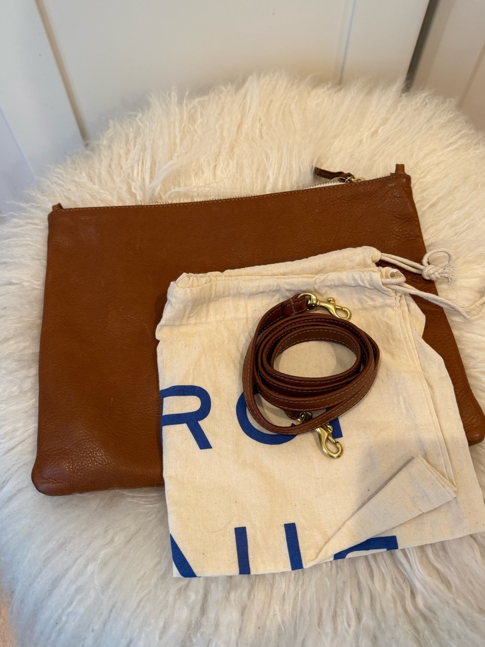 Clare V, tan flat clutch w/ tabs